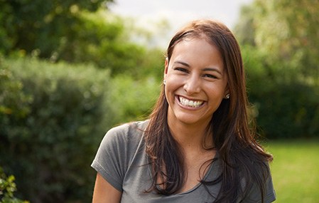 Woman smiling outside