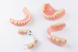 Different types of dentures in Texarkana on white background