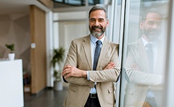 Man smiling in an office