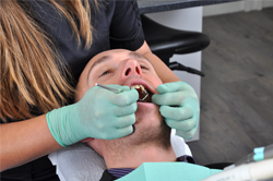 man receiving dental care
