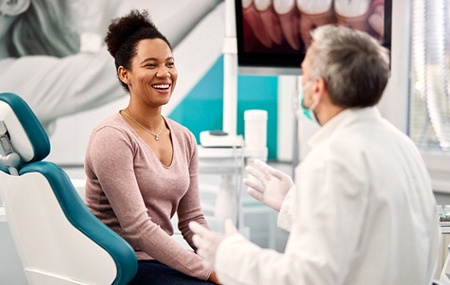 patient talking to dentist about gum disease in Texarkana