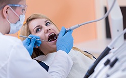 Woman receiving dental treatment