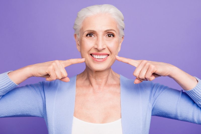 Woman smiling.